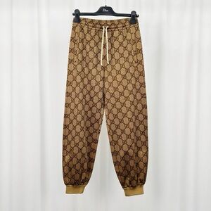 Authentic Gucci Tan Monogram Track Pants